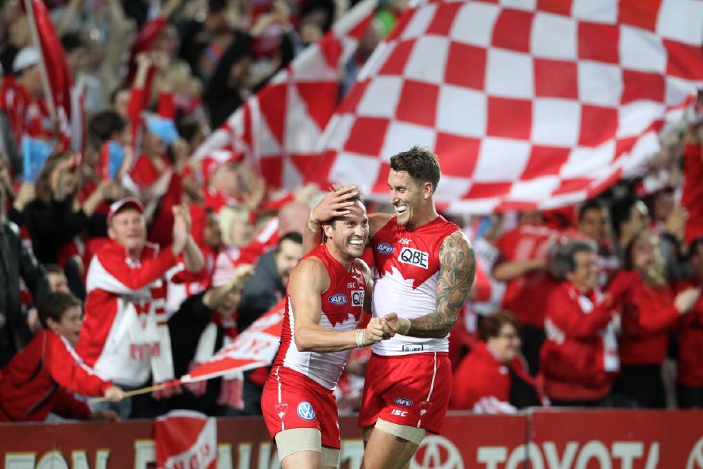 Jude Bolton celebrates a goal during the semi final game between Sydney Swans vs Carlton Blues on Saturday 14th September, 2013. Photo: Anthony Johnson 