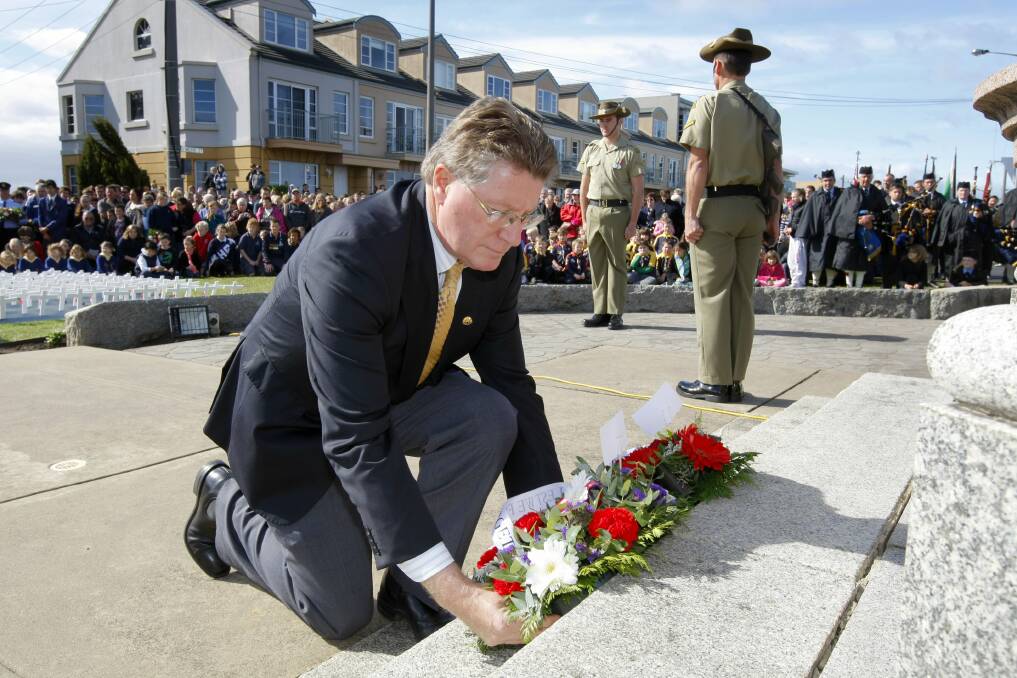 Denis Napthine lays a wreath at the Warrnambool War Memorial for Remembrance Day in 2011.