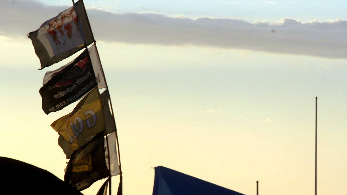 2012: The ute paddock skyline is scattered with flags flying from aerials. Picture: Daisy Huntly