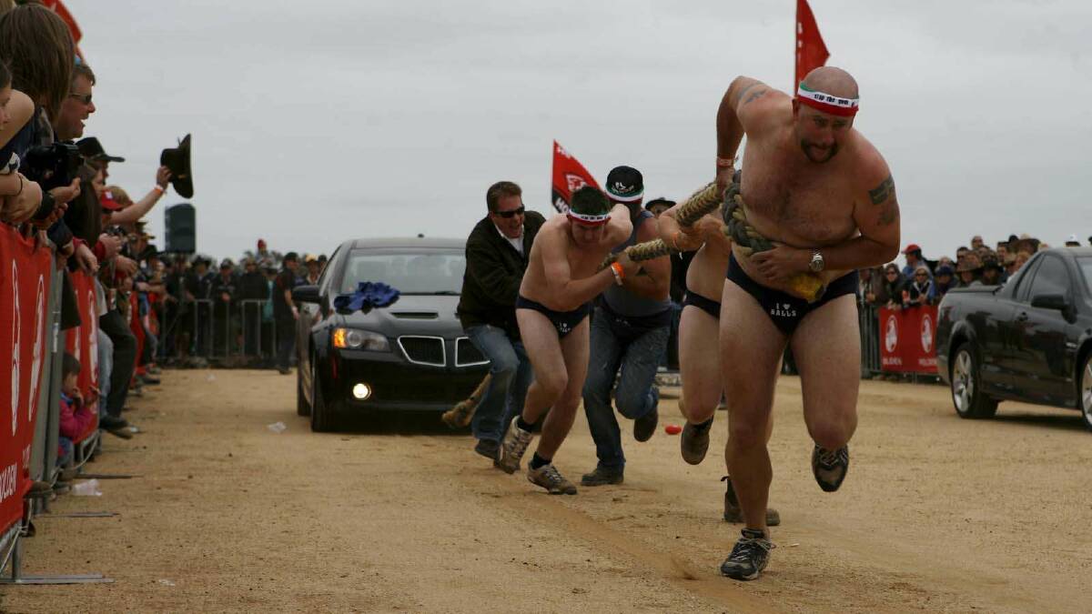 These lads named Tough Nuts stripped down to their jocks to compete in the Holden Grunt Off. The boys entertained the crowd but lost their heat. Picture: Simon O'Dwyer