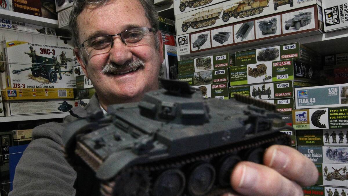 Kelly Knott with a Panzer II flamethrower tank. Picture: BEN EYLES 