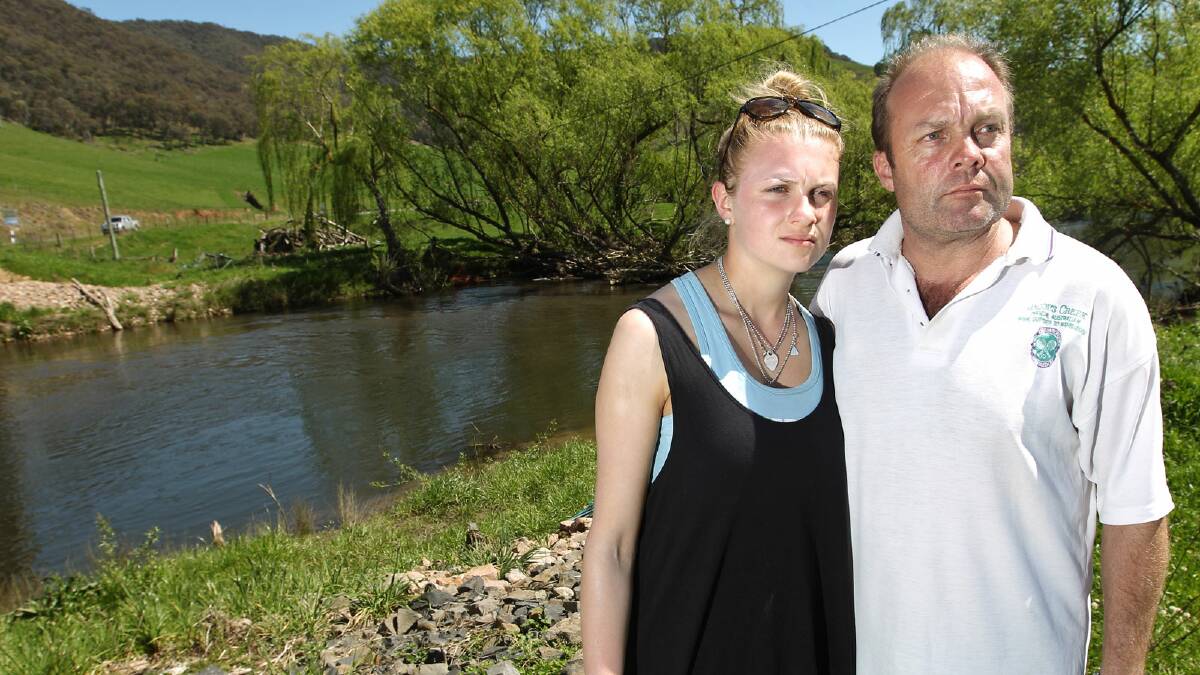 Amy Dickinson's sister Laura and father Cam. Picture: BEN EYLES