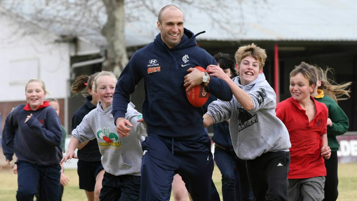 Carlton captain Chris Judd proved a hit with school kids from Benalla yesterday.