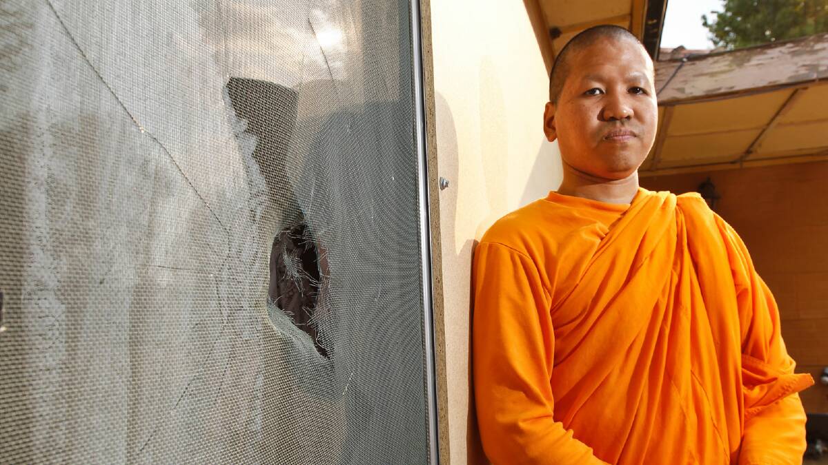 Buddhist monk Ajahn Satit pictured with the recent damage to the Albury temple. Picture: Ben Eyles 