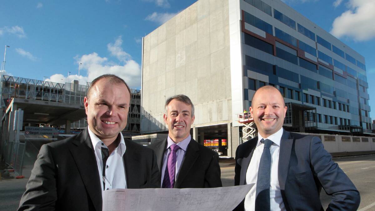David Harper, Barry Morgan and Matthew Tripolone  at the site of the new hotel yesterday. Picture: KYLIE ESLER