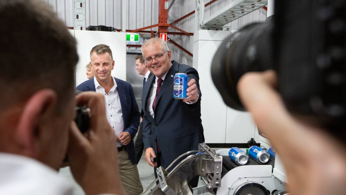 Prime Minister Scott Morrison and Liberal candidate for Gilmore Andrew Constance visit East Coast Canning in Culburra. Picture: James Croucher