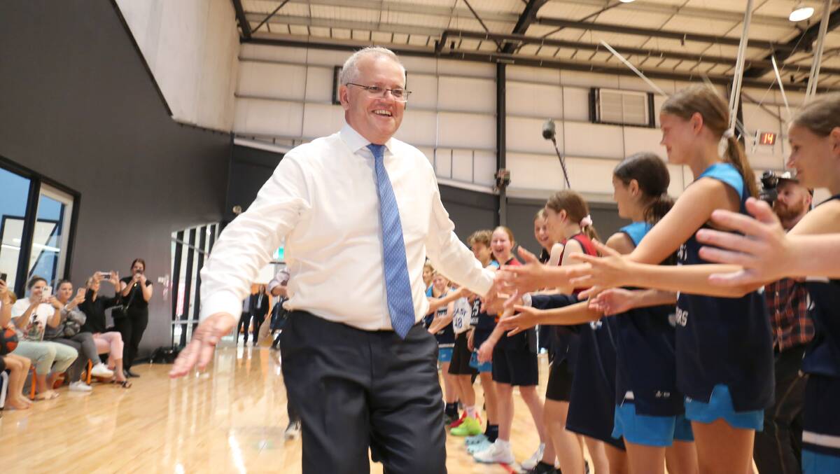 Prime Minister Scott Morrison was unlikely to run into foes while meeting under-12 basketballers in Torquay in the electorate of Corangamite. Picture: James Croucher