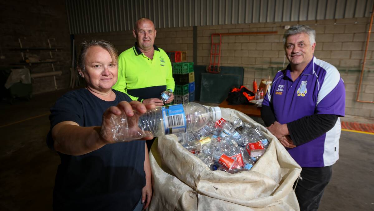 CAN IT: Heather Goesch and Bruce Forbes with John Waldron from the Cancer Council in Lavington. Picture: JAMES WILTSHIRE