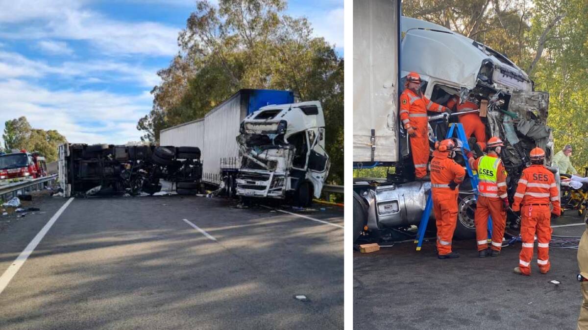 Fire and Rescue crews are working to clear the lanes after emergency services including the SES freed a man trapped in his vehicle in the two-truck crahs. Picture: FRNSW