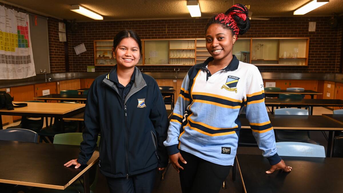 THRIVING: Murray High students Aruna Majhi, 16, Year 11, and Divine Angalikiyana, 18, Year 12, are hoping to pursue careers in health. Picture: MARK JESSER