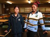 THRIVING: Murray High students Aruna Majhi, 16, Year 11, and Divine Angalikiyana, 18, Year 12, are hoping to pursue careers in health. Picture: MARK JESSER