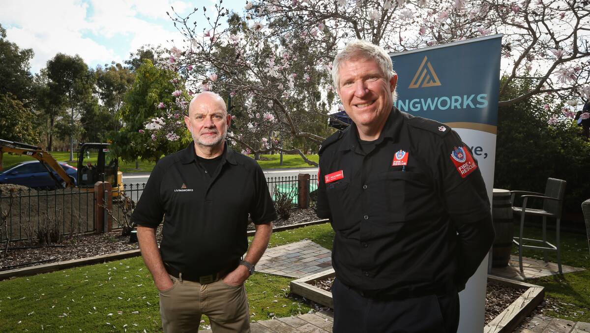 SAVING LIVES: LivingWorks training facilitator Chris Pidd and Fire and Rescue NSW inspector Phillip Eberle after the SafeTalk suicide first aid session at the Hovell Tree Inn in Albury. Picture: JAMES WILTSHIRE