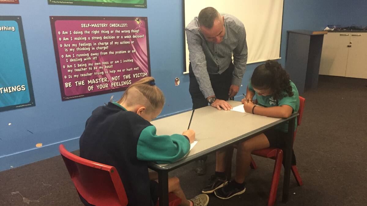 ASSESSMENT TIME: Principal Ben Slocombe with year five students at Melrose Primary School. The year three and year five students have started NAPLAN tests.