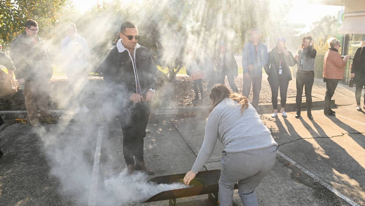 CLEANSING CEREMONY: Aboriginal man Johnny Murray performed the welcome to country for the opening of the Victorian Aboriginal Child Care Agency (VACCA) Wodonga office. Picture: MARK JESSER