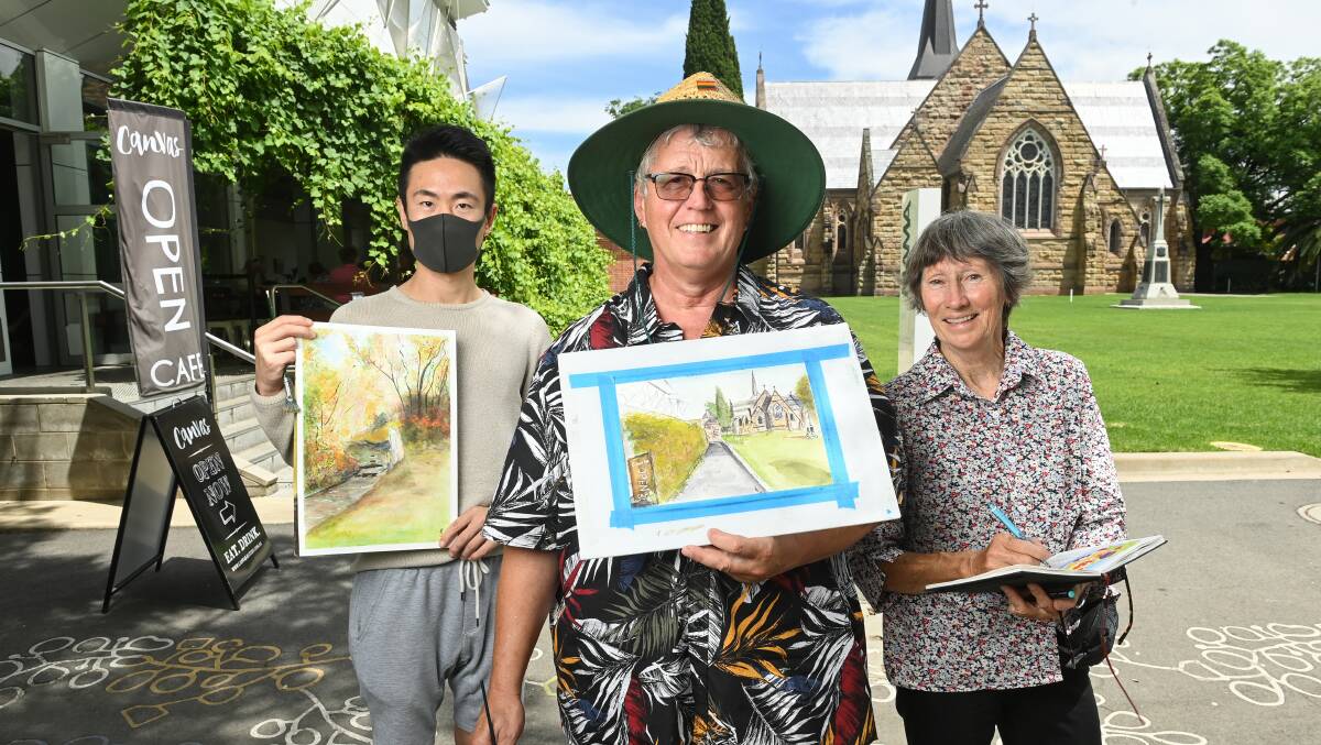 PICTURE PERFECT: Gregg Wilson (centre) is founding Albury-Wodonga Sketchers group, which already has some keen new members in Ian Han and Anne Sand. PICTURE: MARK JESSER