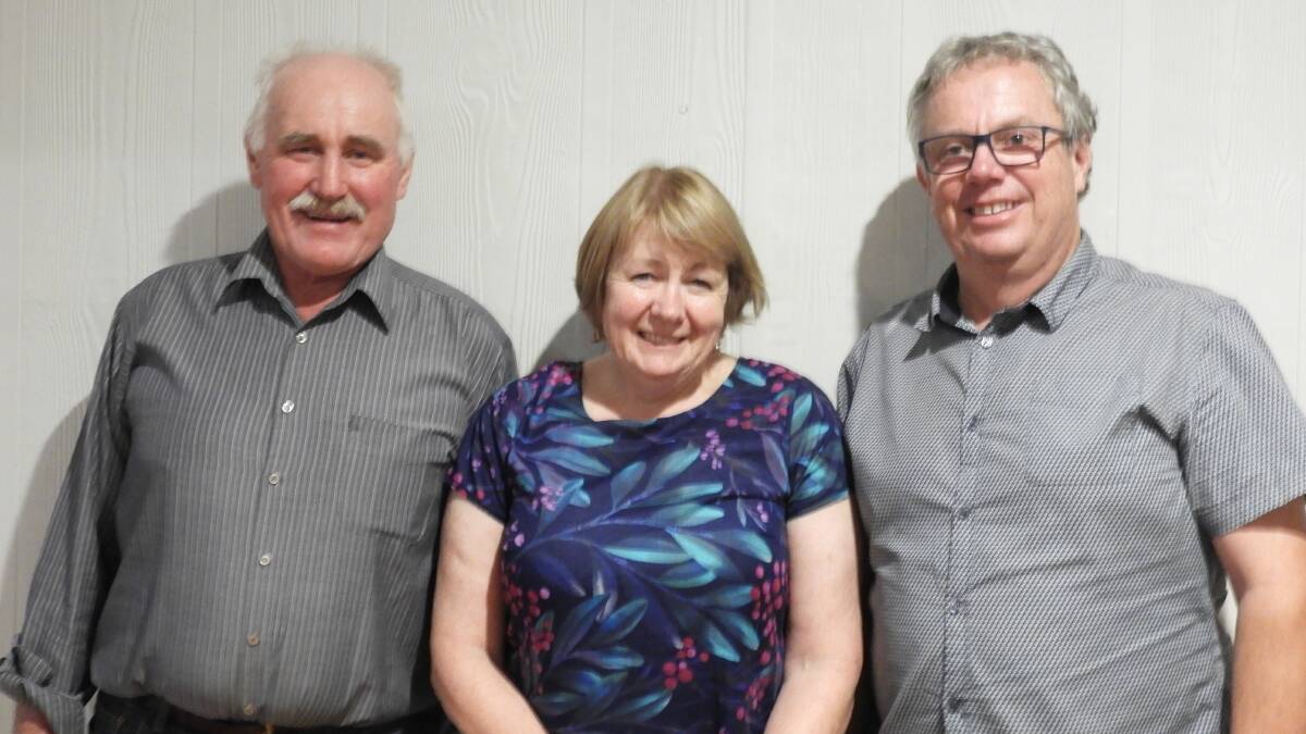 WINNERS ARE GRINNERS: Gordon Nicholas with his wife Janet Nicholas and Towong Shire mayor Andrew Whitehead. Picture: SUPPLIED