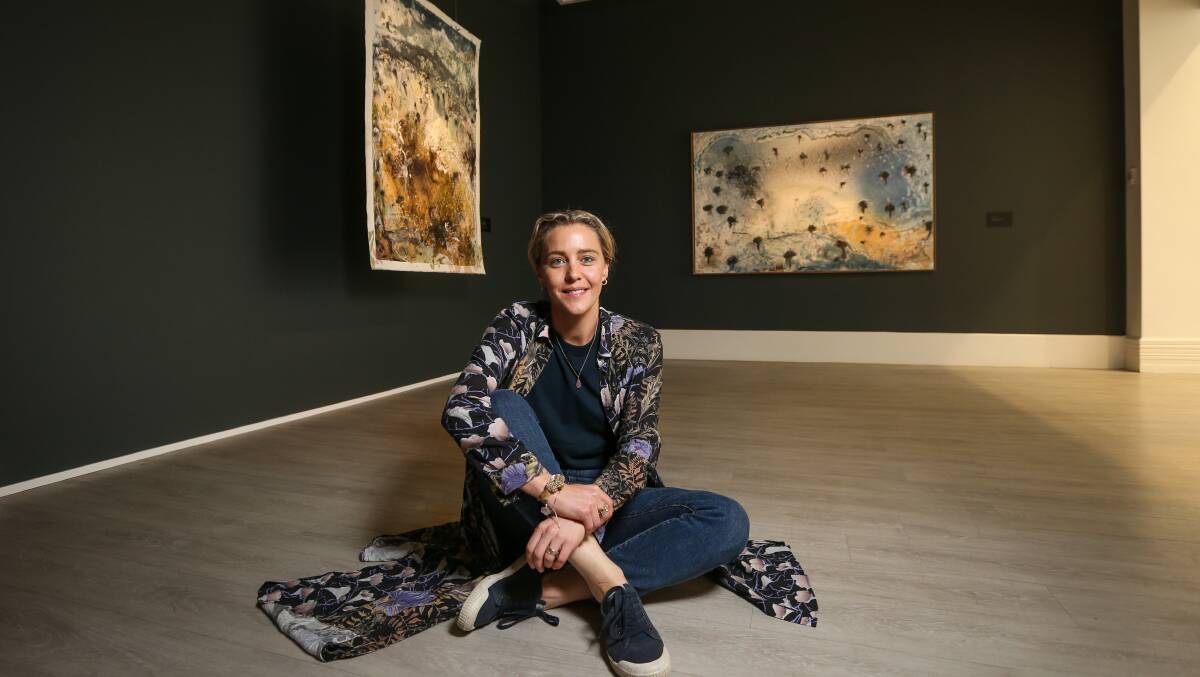 IN THE FLESH: Artist Julia Roche in front of some of her artworks at MAMA. Ms Roche presented an artist talk on Saturday. Picture: JAMES WILTSHIRE