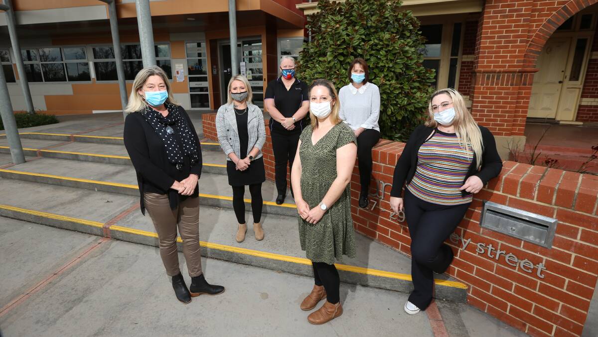 READY TO LISTEN: The Upper Murray Family Care kinship carers team in front of their Stanley Street office in Wodonga. Kinship Carer Week runs from September 6 to 10 this year. Picture: JAMES WILTSHIRE