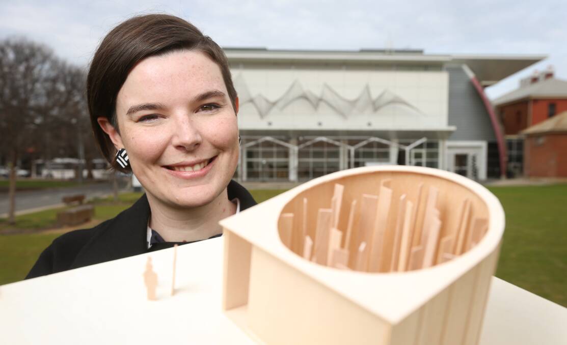 MODEL ARCHITECT: Albury's Carly Martin with her design for the Summer Place temporary pavilion that will be on show in QEII Square from November to March. Pictures: JAMES WILTSHIRE