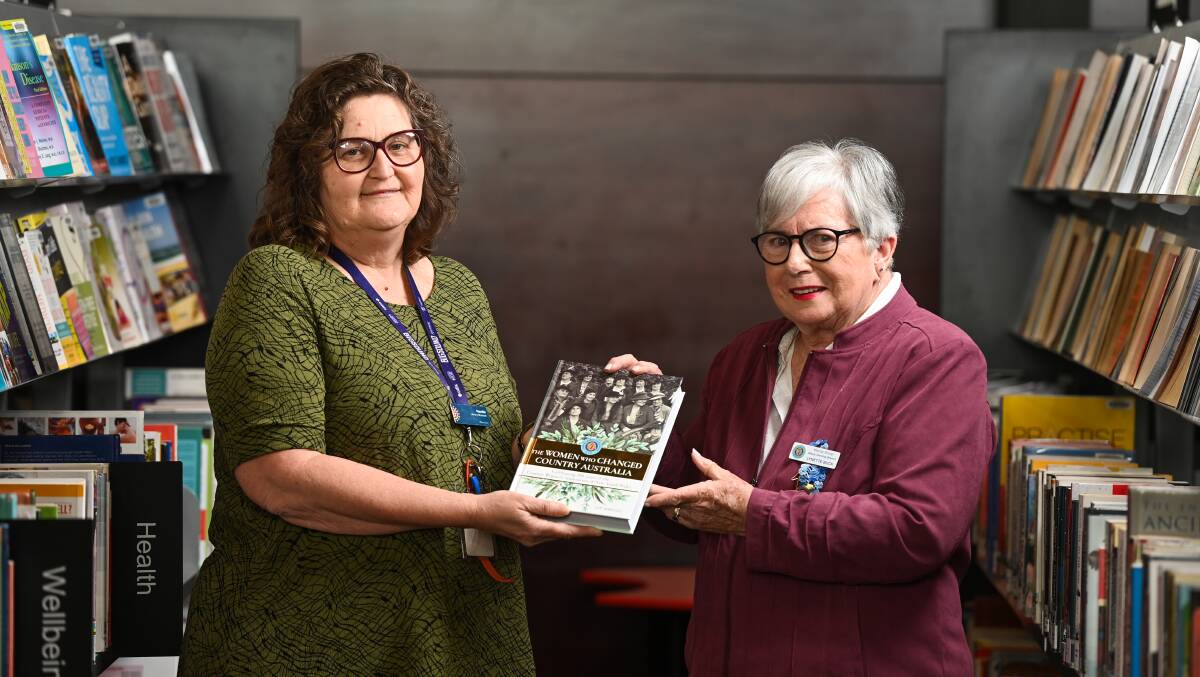 DONATED: Learning and outreach officer Narelle Drewe with CWA Murray group president Lynette Buck. Picture: MARK JESSER