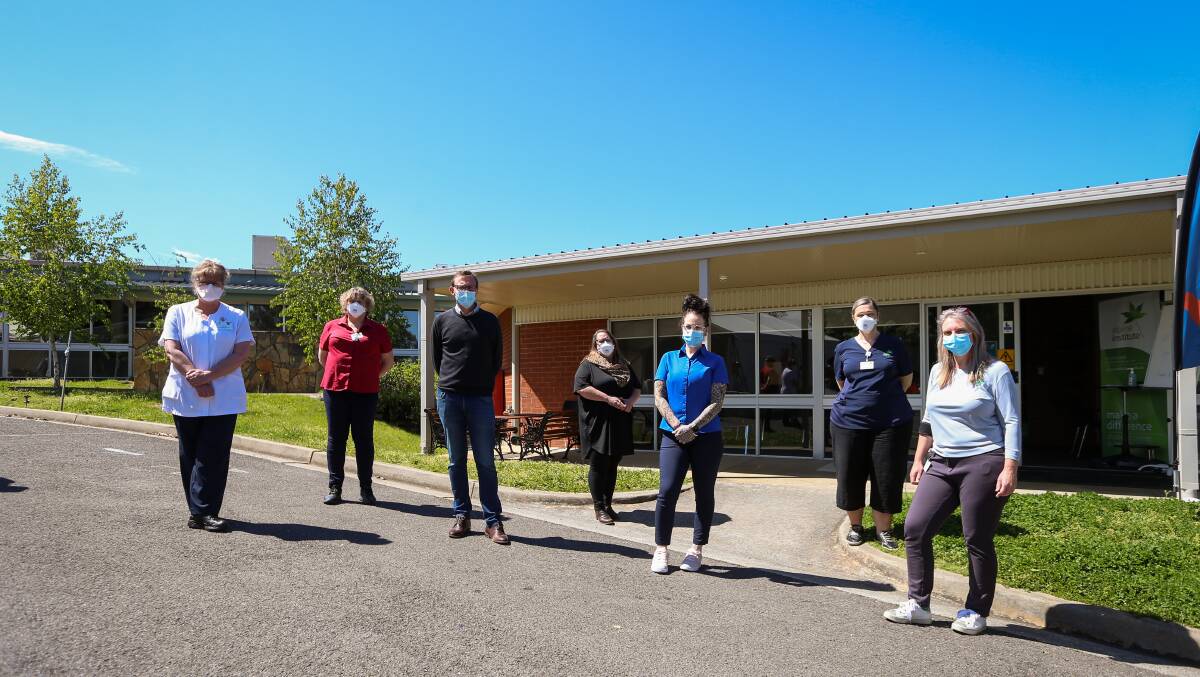 Alpine Health staff in front of the Myrtleford hospital vaccination clinic. Picture: JAMES WILTSHIRE
