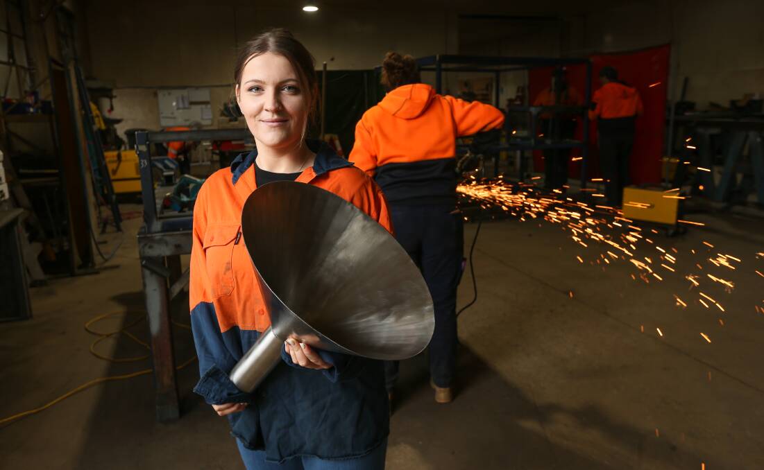 TAKING CHARGE: Wangaratta's Brittany Gibbs is holding a funnel, which by the end of the training course, she will be able to make herself. Picture: JAMES WILTSHIRE