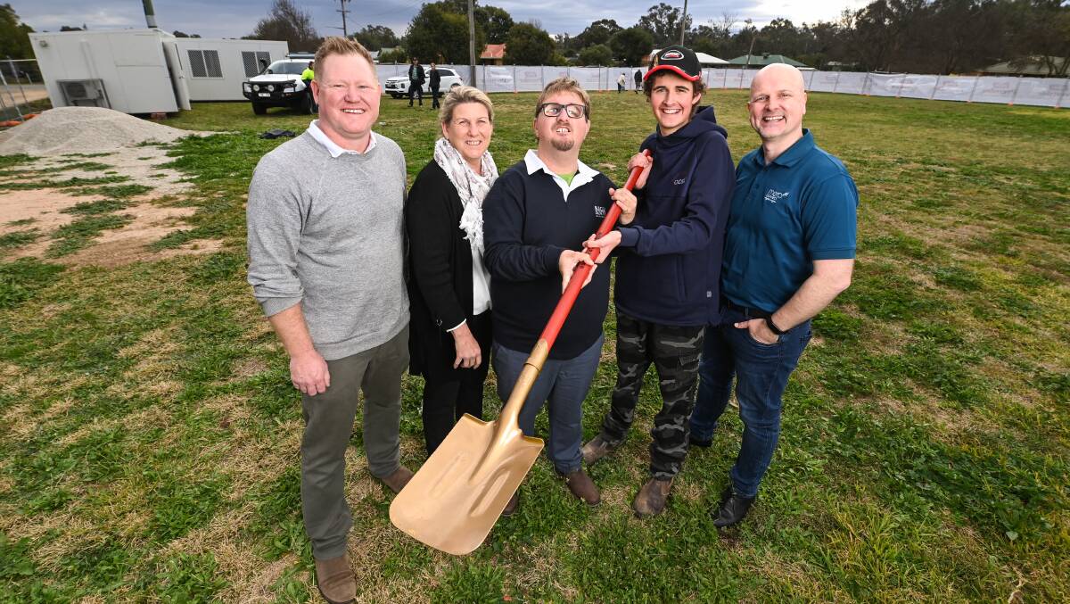 Hunder construction: henty Respite Trust chairperson Ben Hooper, Colleen and Will Kleine, Harry Janetzki and Mercy Connect chief executive Trent Dean. Picture: MARK JESSER