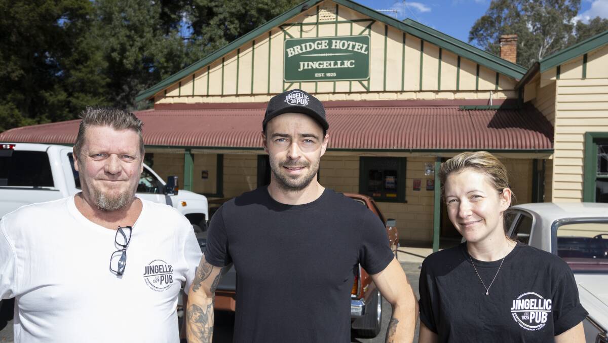 AWAITING THE GIG: Jingellic Hotel employee Adam Teese, with pub manager Michael and Brooke Moffatt. Picture: ASH SMITH