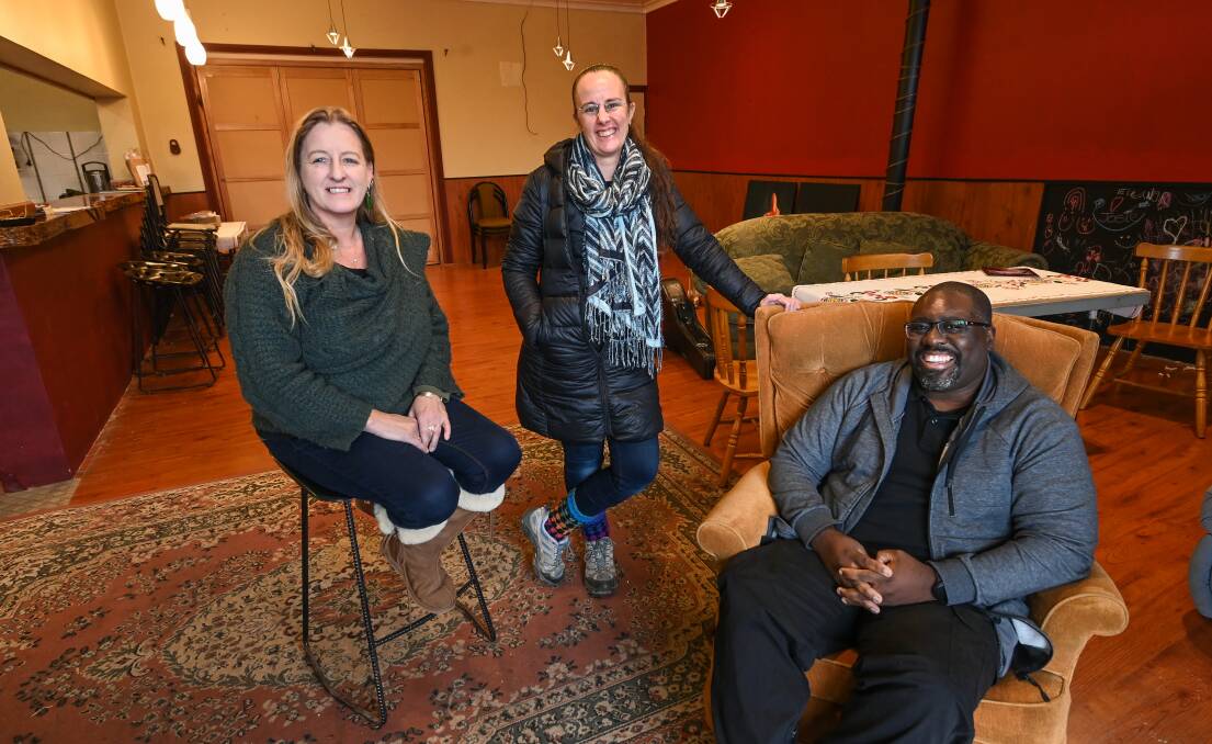 WELCOMING: Shelter volunteers Di Duursma, Donna Prentice and James London at Zac's Place on Wills Street, which is open Tuesday from 2-5pm and Wednesday from 12-2pm for people to receive respite during the day. The Night Shelter operates from numerous locations. Picture: MARK JESSER