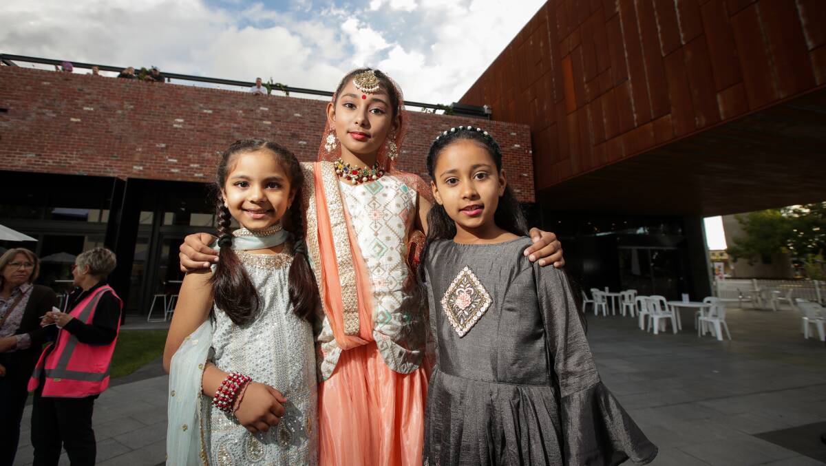 YOUNG DANCERS: Rehmat Kaur Sandhu, 6, Nayamat Kaur Sandhu, 10, and Alivia Singh, 6, from the Rhajastani Dance Group did a Bollywood dance at the event. Picture: JAMES WILTSHIRE