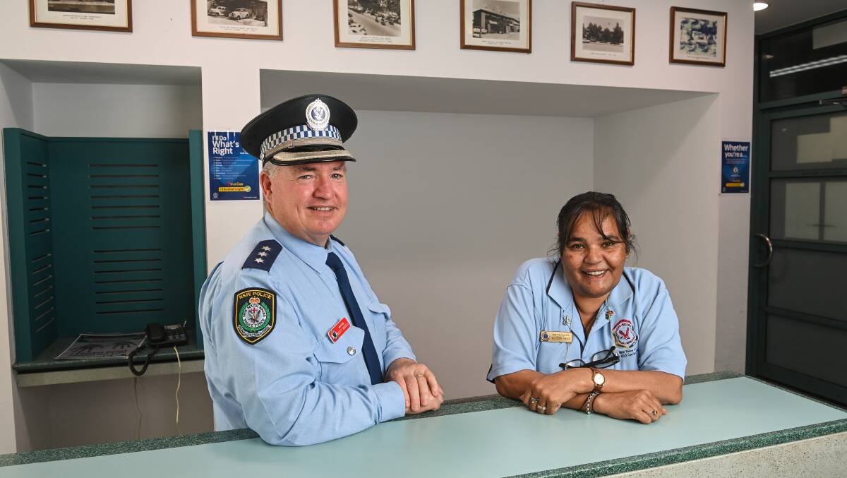 COLOUR COMING: Albury Police's Inspector Scott Russell and Aboriginal Community Liaison Officer Alison Reid in front of the alcove which will home the Minya Art project mural from early next year. Picture: MARK JESSER