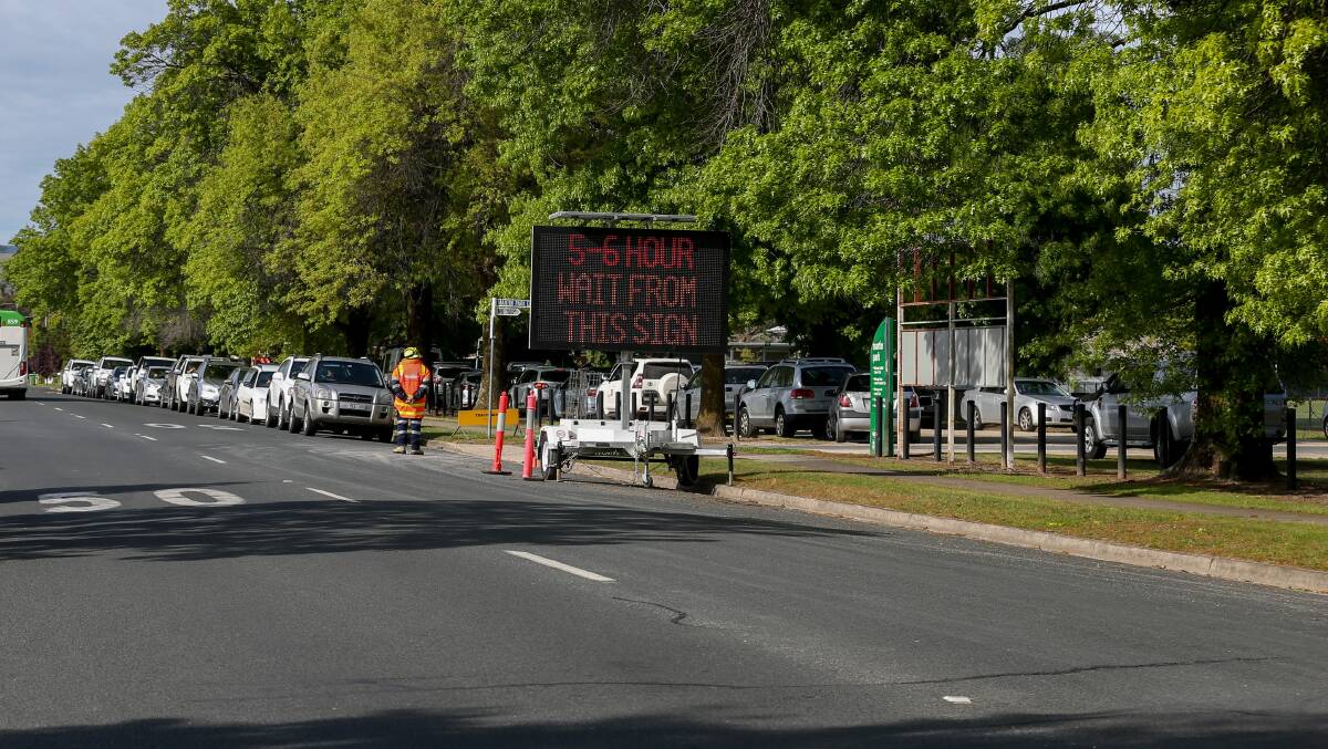 TESTING SITE: This sign was up by 10.30am on October 18 as people queued for a test in Wodonga. Picture: TARA TREWHELLA