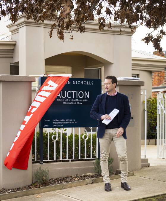 NO BIDS: Lachlan Hutchins of Stean Nicholls received no bids at the auction of 737 Jones Street on the weekend. Picture: ASH SMITH