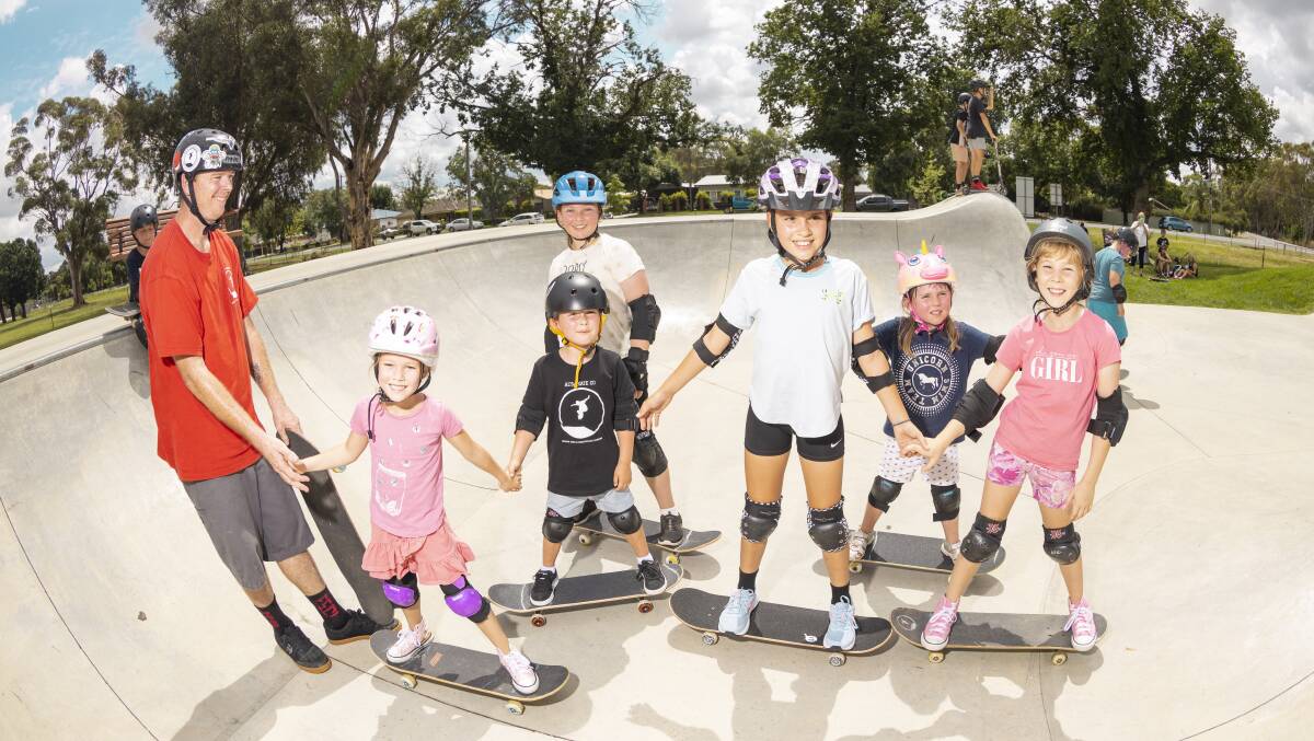 NEW FRIENDS: Al Taylor with some of the children who participated at the Jindera skatepark workshop. Picture: ASH SMITH
