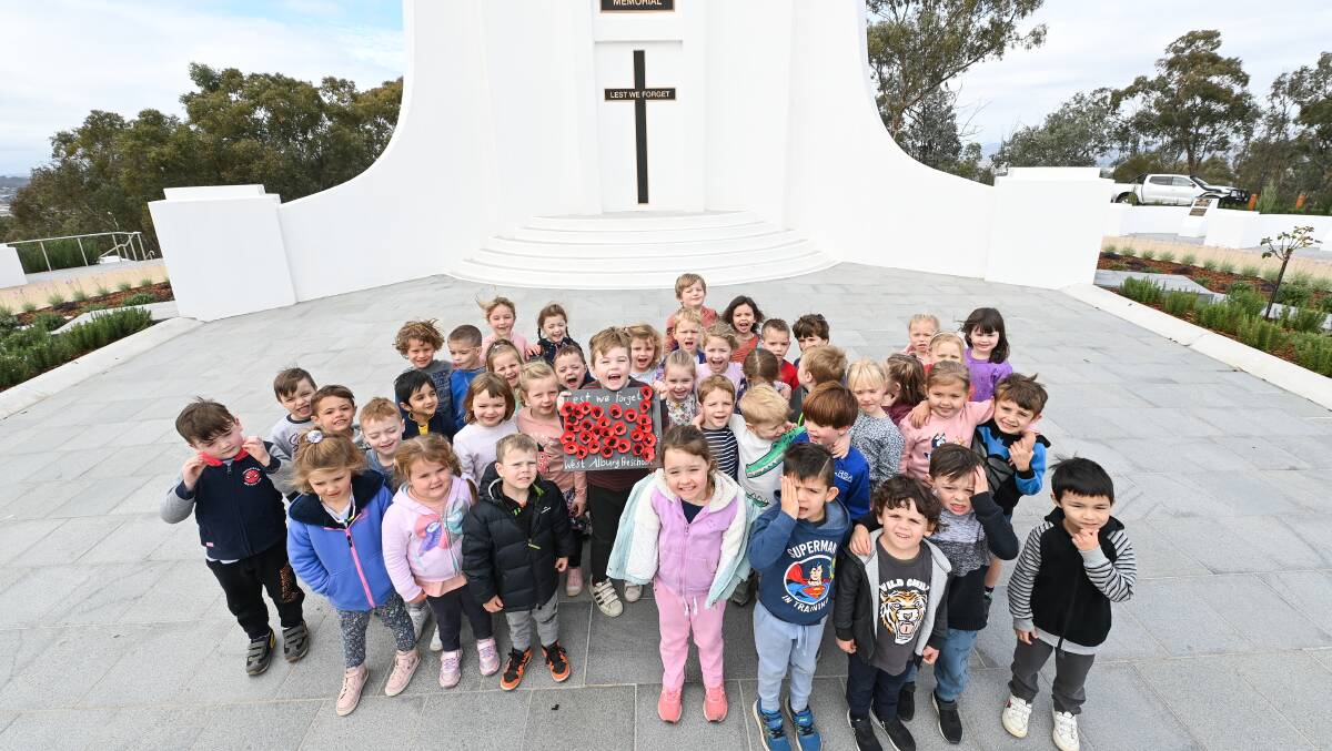 LEARNING OPPORTUNITY: West Albury Preschoolers at Monument Hill drawing pictures of the Monument ahead of Anzac Day. Picture: MARK JESSER