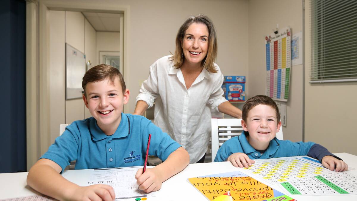 STUDY CATCH UP: Wodonga Tutoring Hub's Tanya Bryant with Druss, 9, and Baiden, 6. Ms Bryant said there have been more inquiries since students were homeschooled during lockdowns last year. Picture: JAMES WILTSHIRE.