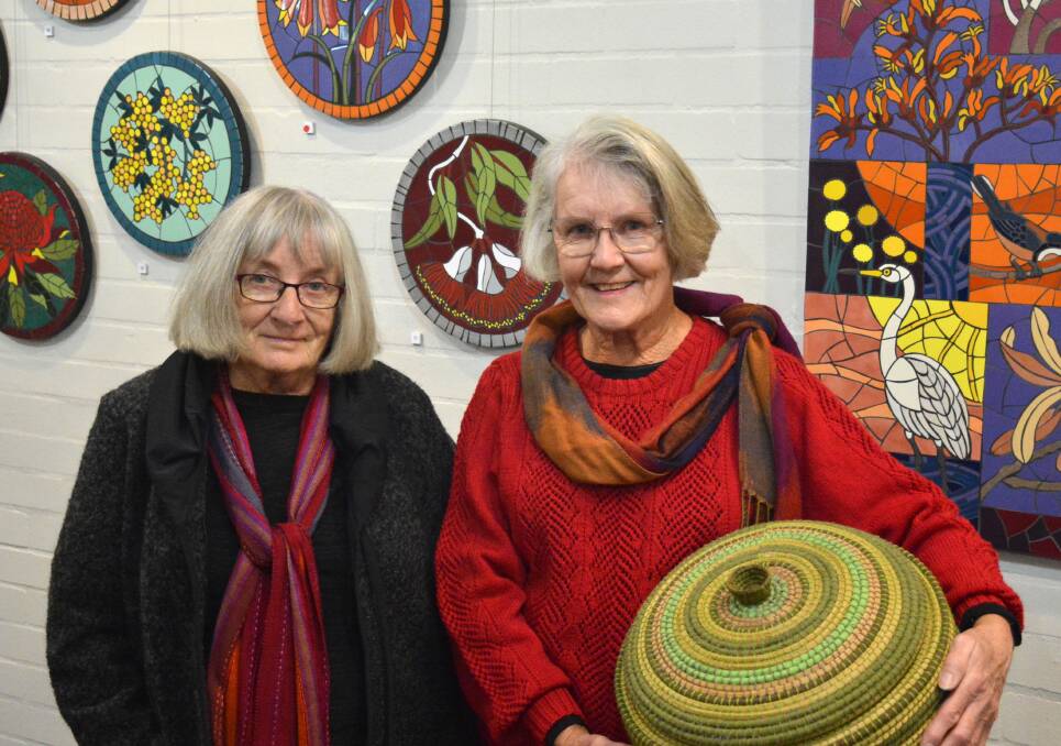 SISTERLY DUO: Sisters Corowa's Pam Fredericks and Albury's Joan Asmussen will exhibit their artwork at Australian National Botanic Gardens this month.