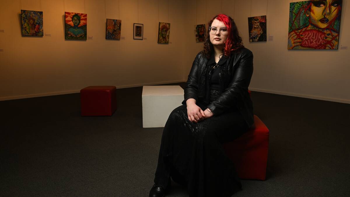 DEBUT EXHIBITION: Wodonga artist Monique Barrett with her debut exhibition 'Faces' at the GIGS Art Gallery. Picture: MARK JESSER