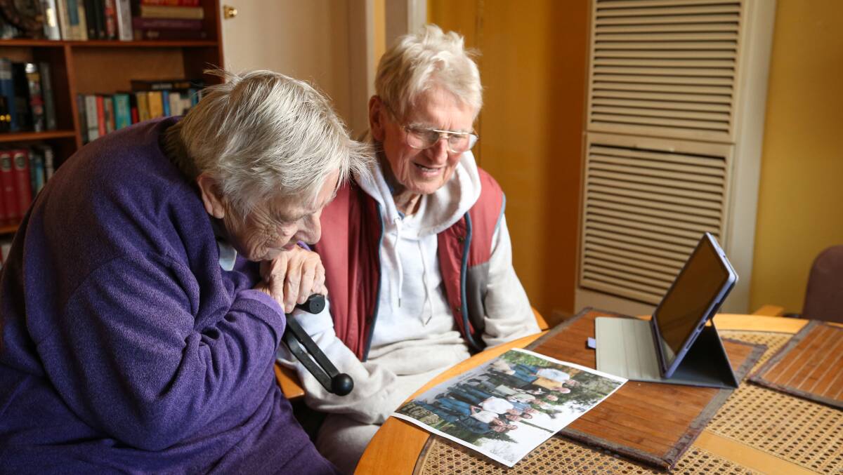 IN TOUCH: Walla's Netty and Bob Vangelder use their iPad to video call family members in the Netherlands. Pictures: JAMES WILTSHIRE
