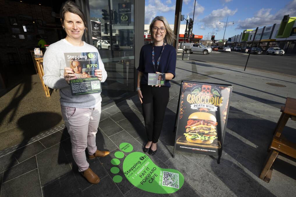 PAY IT FORWARD: Junction Support Services' Sara Clift and Beyond Housing's Kate O'Brien, at Burger Urge, are encouraging the community to support the campaign and help people experiencing homelessness. Picture: ASH SMITH