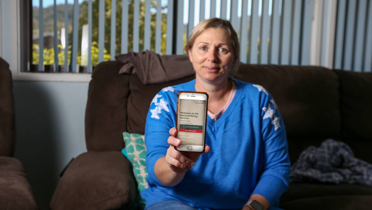 FED UP: Albury resident Leisa King, who is deaf, says it is very frustrating when businesses hang up when she calls them through the National Relay Service. Picture: TARA TREWHELLA