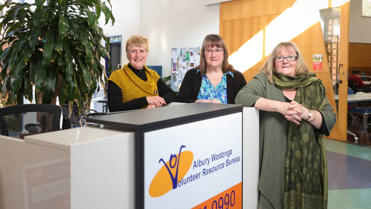 CALLING FOR BACKUP: Albury Wodonga Volunteer Resource Bureau volunteers Shirley Schubach and Pam Hewitt with participation manager Sharon Pellas. Picture: JAMES WILTSHIRE