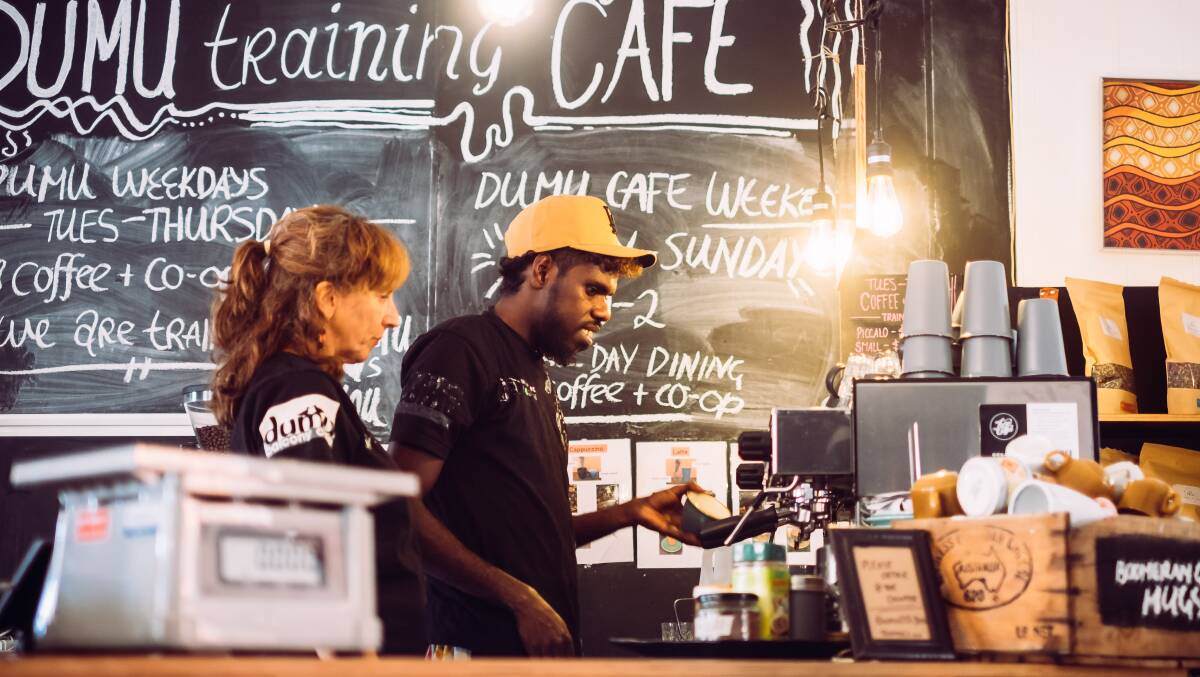 HELP NEEDED: Cafe Demu staff trainer Simone Dole with Benedict Mullumbuk. The Bright cafe has reduced hours due to not having enough staff members. Picture: SUPPLIED