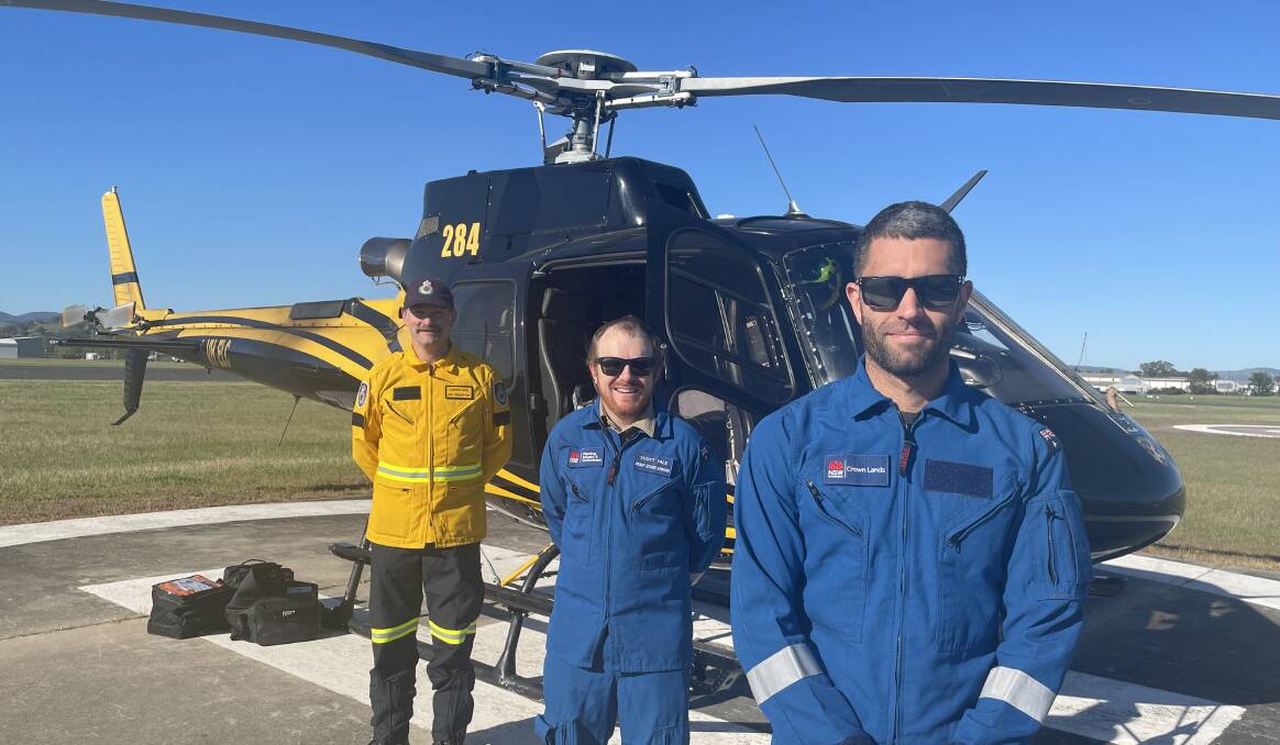 BEFORE TAKE OFF: NSW RFS southern border team member Andrew Davis, Crown Lands air observer Scott Vale and mission commander Shaun Flood (left to right). Picture: VICTORIA ELLIS