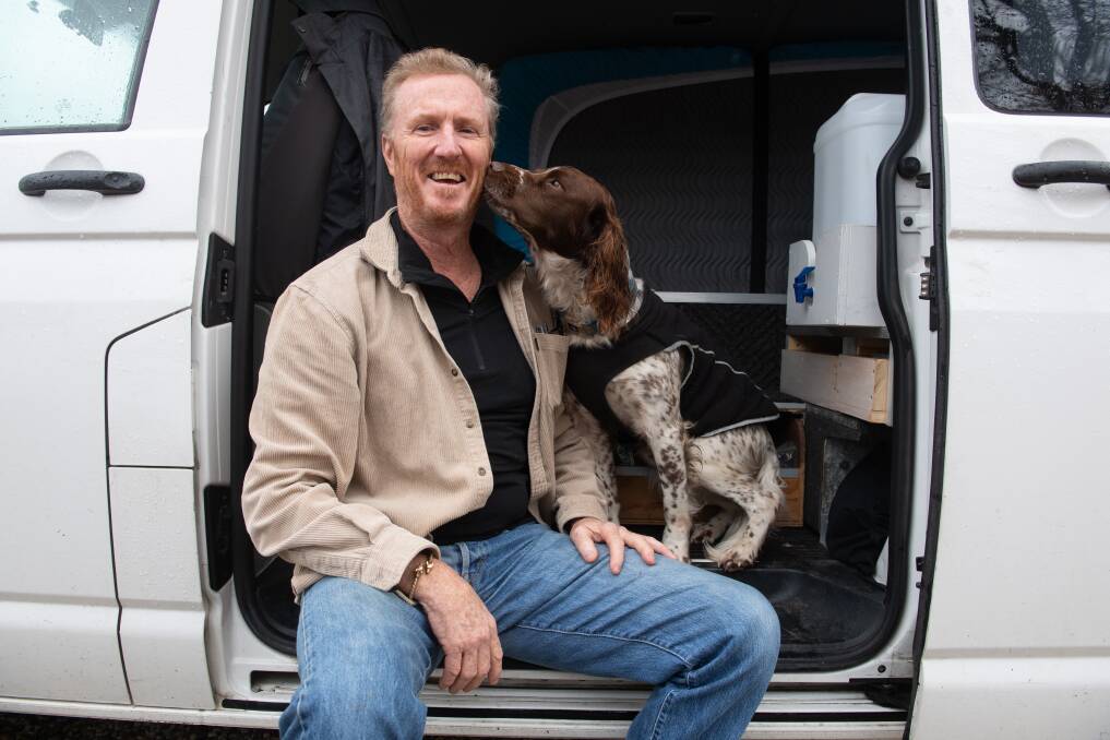 HOME AND HOUND: Former Gold Coast resident Michael Smith says he made the move to Mount Beauty, with his dog Stich, due to COVID-19. Picture: MARK JESSER