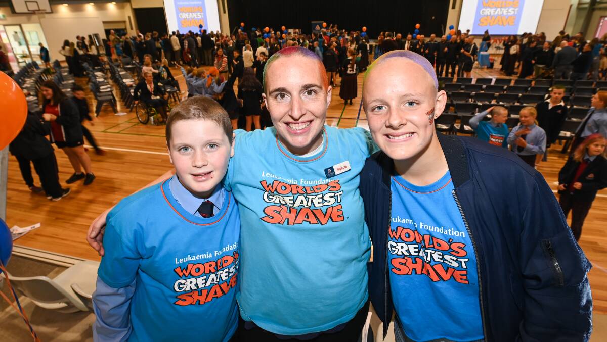 TOP FUNDRAISERS: Year 5 student Alyssa Jarrott, Teacher Megan Craig and year 8 student Luella Aldridge raised the most money for the World's Greatest Shave at Trinity Anglican College. Picture: MARK JESSER