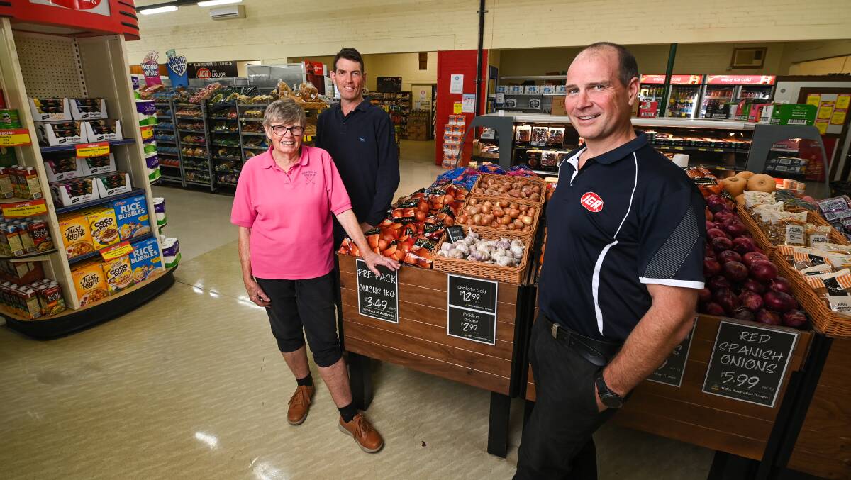 PASSING THE BATON: Holbrook's Tony Geddes and Margaret Geddes have handed over their IGA to new owners Mick Dare and Nick Cook (not pictured) after it has been in the family for 30 years. Picture: MARK JESSER.
