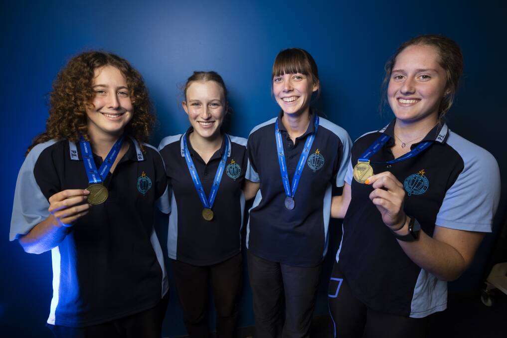 GOLDEN GIRLS: Wodonga Senior Secondary College quartet Isla Kirk, Sophie Payne, Abbey Freeman and Somaiya Harriden with their medals. Picture: ASH SMITH