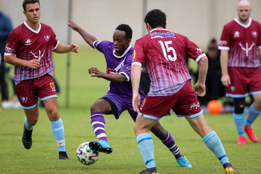 Dirck Angalikiyana finds a way through traffic against Twin City Wanderers. Picture: JAMES WILTSHIRE