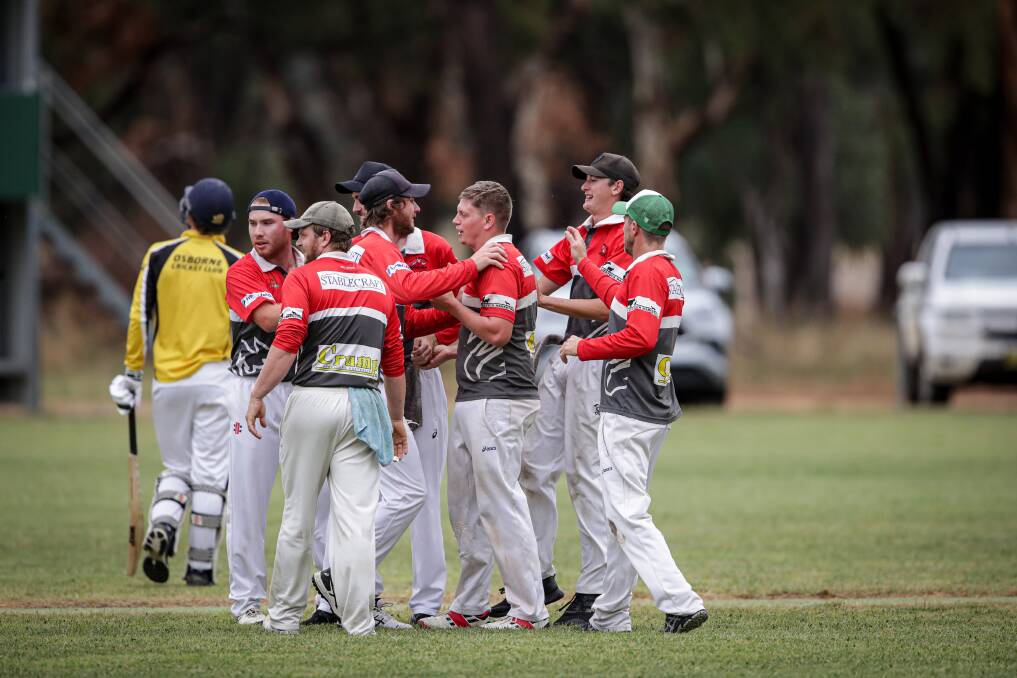 Brock-Burrum celebrate the fall of another wicket. Picture: JAMES WILTSHIRE